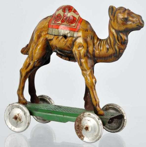 Appraisal: Tin Litho Camel on Platform Nickel Toy German Marked Made