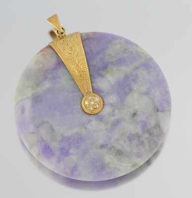 Appraisal: A Chinese Carved Jadeite Bi Disk Pendant in Lavender Jade