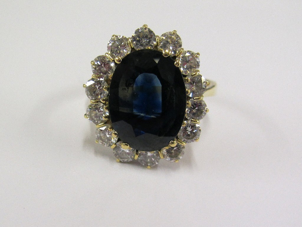 Appraisal: WITHDRAWN Eighteen carat gold sapphire and diamond cluster ring with