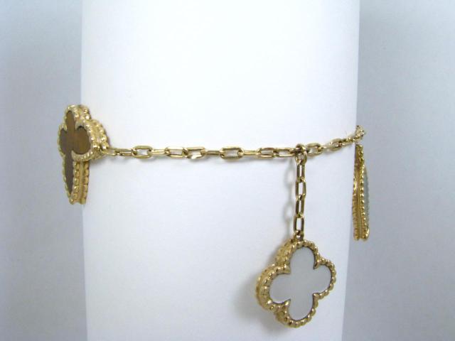 Appraisal: New k yellow gold Van Cleef style bracelet with tiger