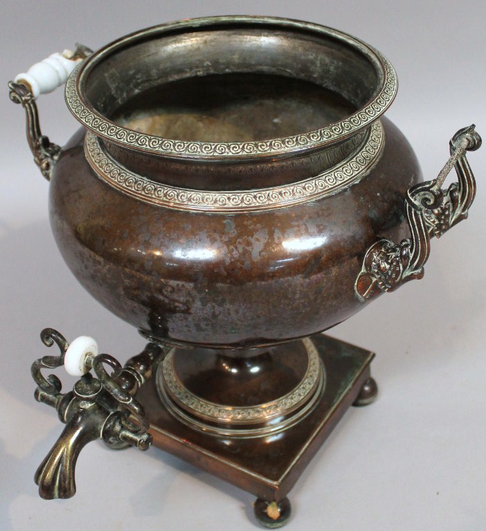 Appraisal: A late thC metal samovar the bellied circular body with