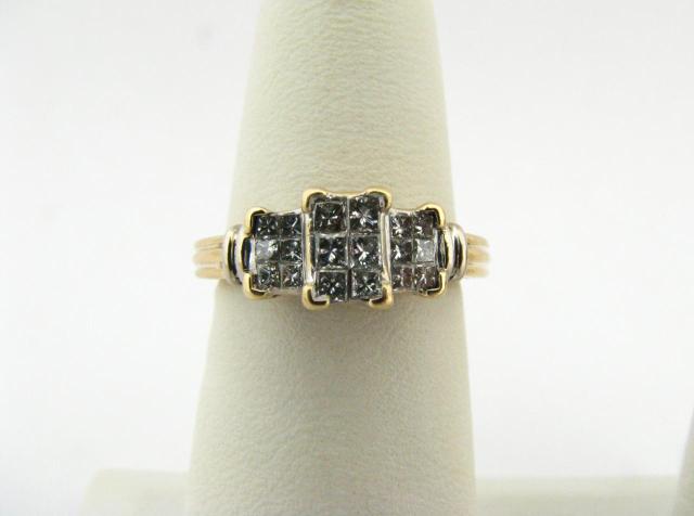 Appraisal: K yellow gold lady's diamond ring with three groups of