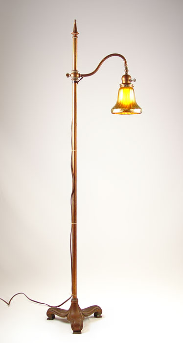 Appraisal: HANDEL FLOOR LAMP footed adjustable height base adjustable angle of