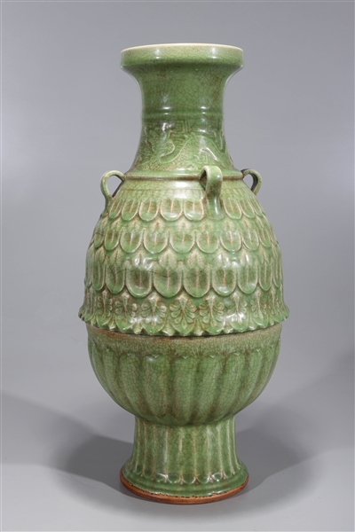 Appraisal: Chinese green glazed ceramic vase with molded handles and incised