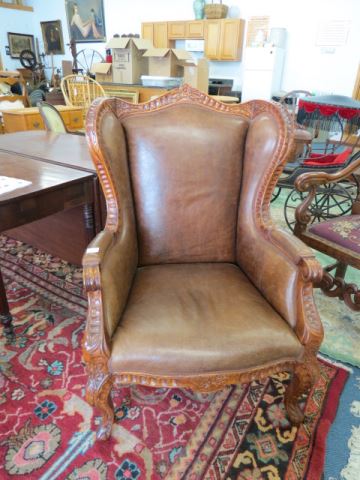 Appraisal: Carved Wood and Leather Wing Back Chair excellent