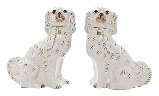 Appraisal: A Pair of Staffordshire Ceramic Spaniels each depicted in a