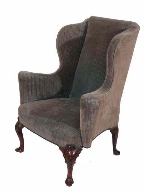 Appraisal: AN ANTIQUE MAHOGANY AND UPHOLSTERED WING ARMCHAIR in th Century