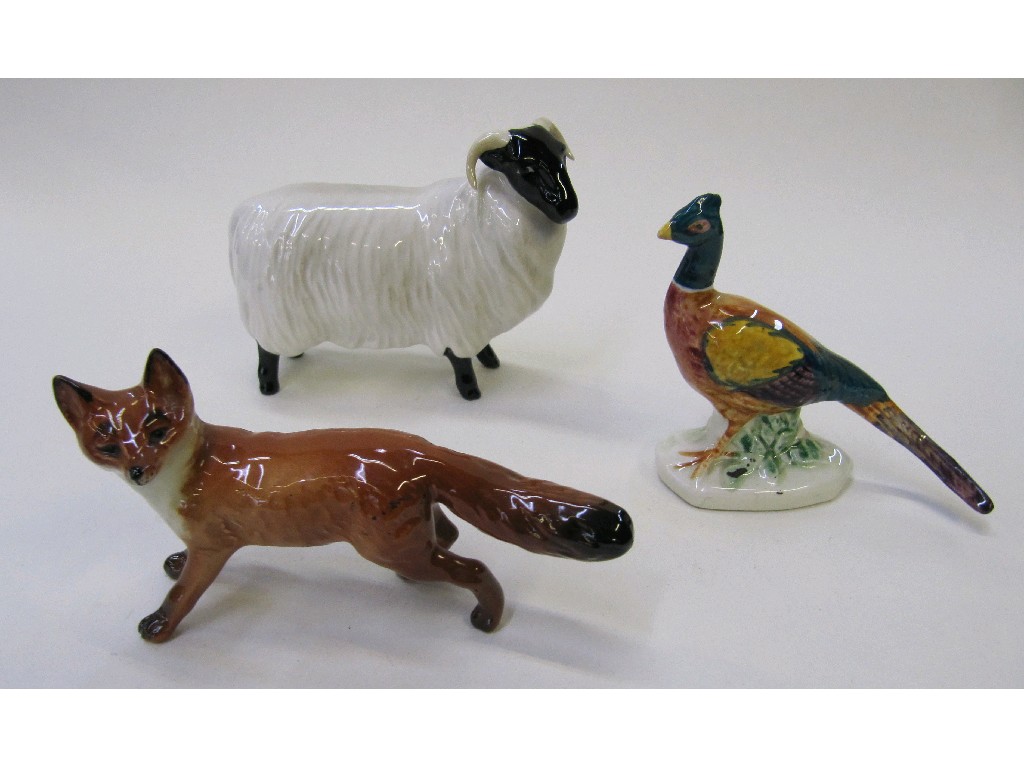 Appraisal: Three Beswick figures to include a ram fox and a