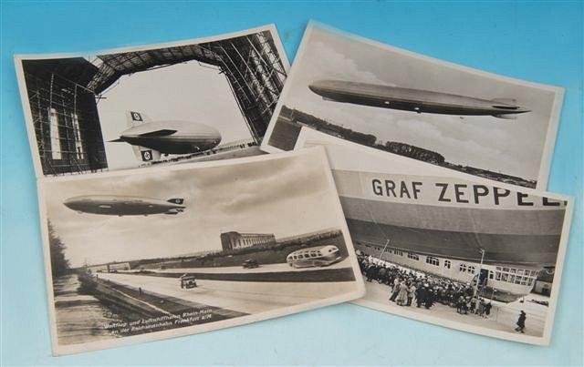 Appraisal: FOUR GRAF ZEPPLIN POSTCARDS circa depicting the Zepplin just outside