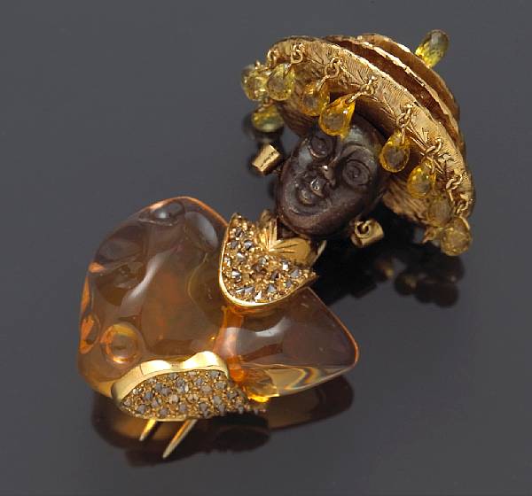 Appraisal: A fire opal yellow sapphire and colored diamond blackamoor brooch