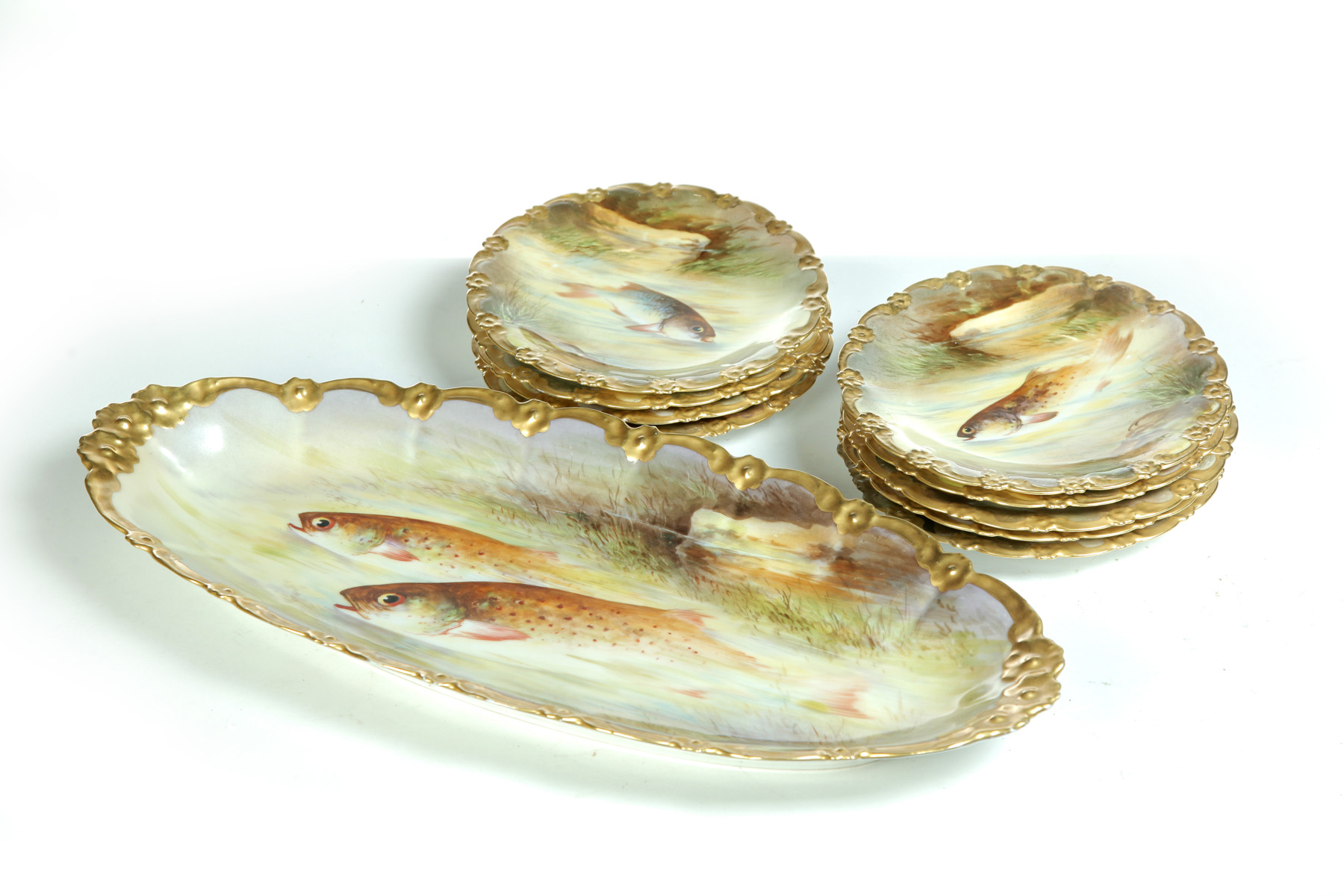 Appraisal: HAND PAINTED LIMOGES TEN-PIECE FISH SET SIGNED BARIN France ca