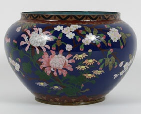 Appraisal: Cloisonne jardiniere with floral designs on cobalt ground H x