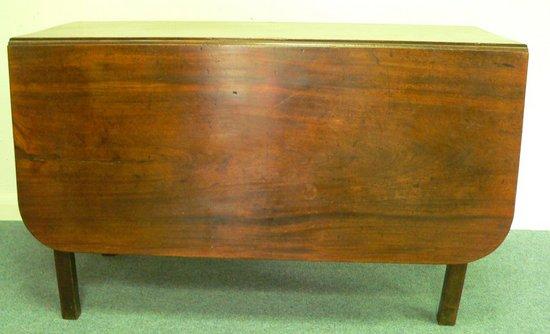 Appraisal: Early th Century rectangular mahogany table two-flap dining table on