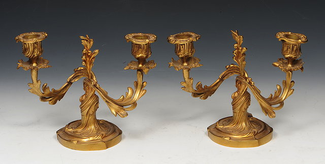 Appraisal: A PAIR OF LATE TH CENTURY ORMOLU TWO BRANCH CANDELABRA