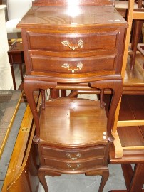 Appraisal: A pair of oak bedside tables with two drawers on