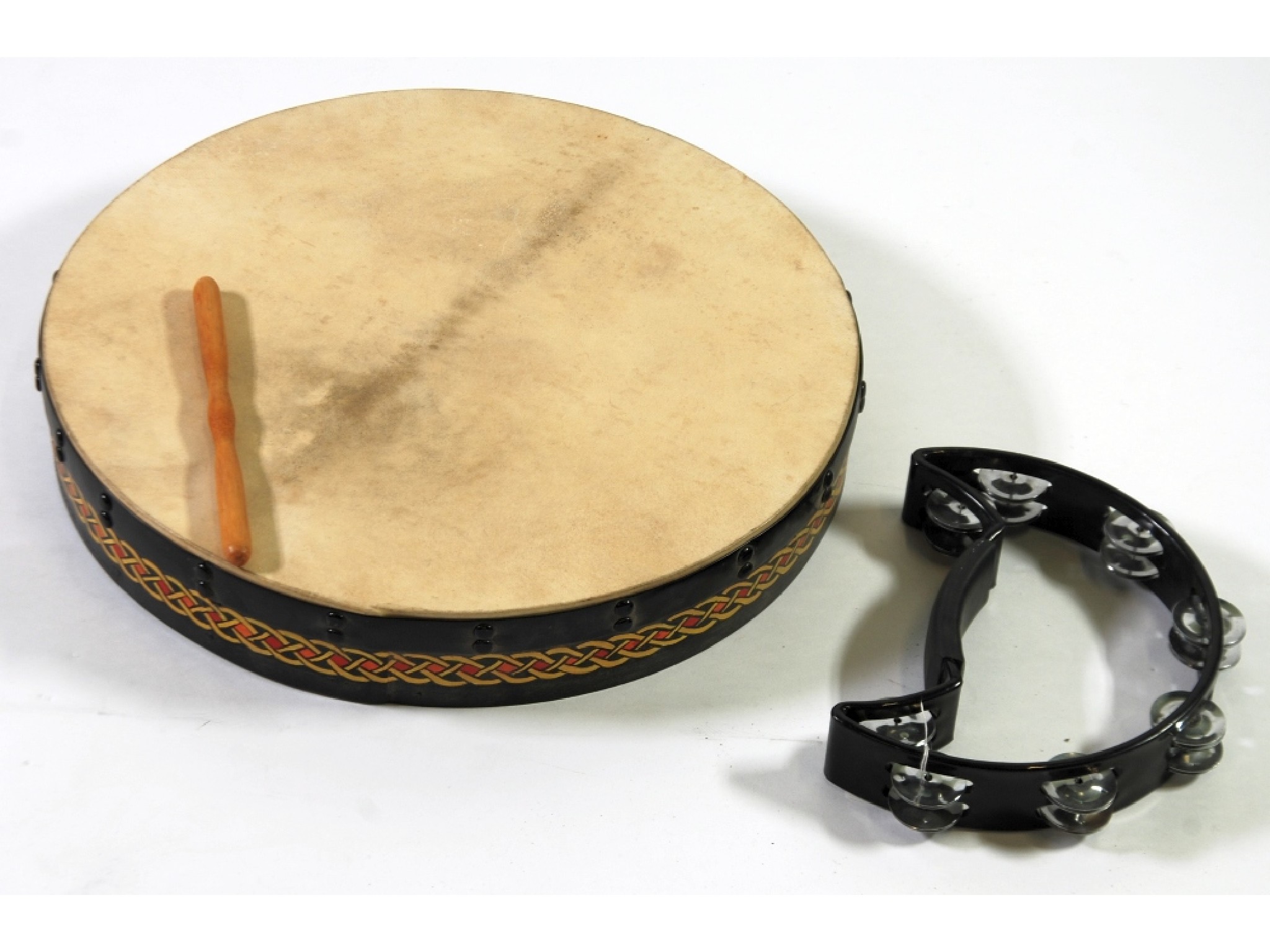 Appraisal: SCOTTISH MANUFACTURE DOBRA DRUM AND BEATER with Celtic pattern hand