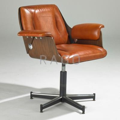 Appraisal: MODERN Swivel armchair s Walnut chromed and enameled metal and