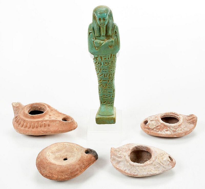 Appraisal: Egyptian Faience Ushabti and Four Early Oil Lamps possibly B