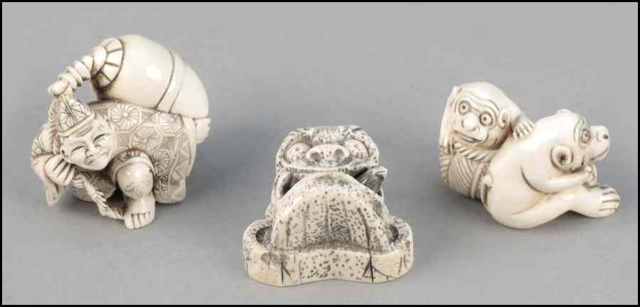 Appraisal: THREE CARVED IVORY NETSUKE All signed Condition No Specific Condition