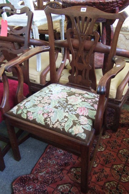 Appraisal: A George III mahogany open armchair with pierced vase shaped