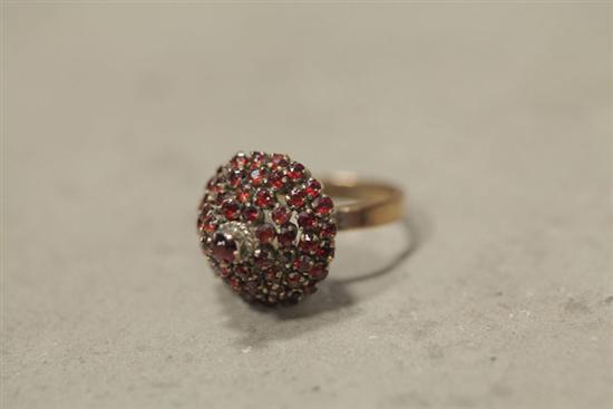 Appraisal: LADIES COCKTAIL RING Peaked cocktail ring with four round rows