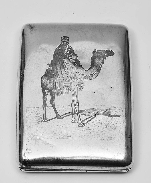 Appraisal: AN EGYPTIAN SILVER CIGARETTE CASE with niello designs to each