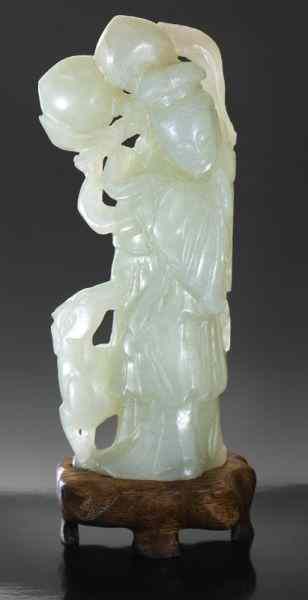 Appraisal: Chinese Qing carved jade figuredepicting Ma Gu Xian Shou ''H