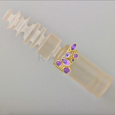 Appraisal: WENDY RAMSHAW RING COLUMN Seven ring stack k yg amethyst