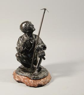 Appraisal: Japanese Meiji period bronze old man smoking opium pipe Japanese