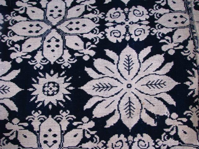 Appraisal: Antique blue and white jacquard half coverlet signature block of