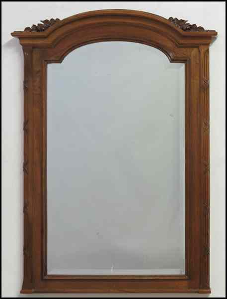 Appraisal: CARVED WALNUT MIRROR With a reed and ribbon motif ''