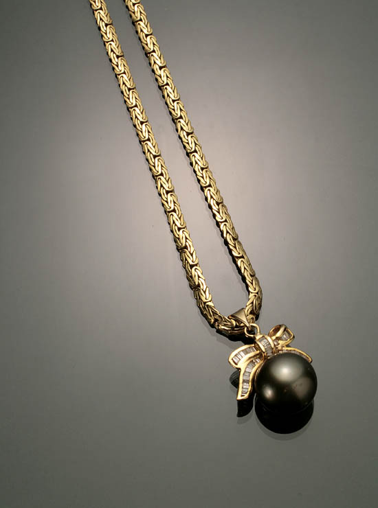 Appraisal: Tested -Karat Yellow-Gold Tahitian Black Pearl and Diamond Pendant Necklace