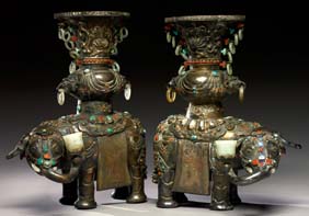 Appraisal: PAIR MONGOLIAN SILVER ELEPHANTS Pair Mongolian silver elephants with elaborate