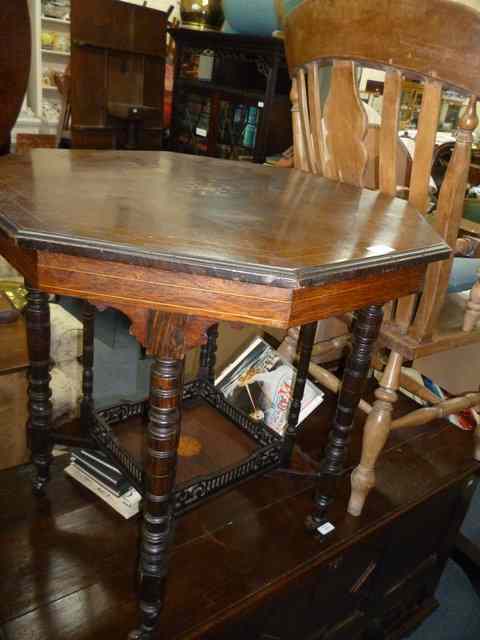 Appraisal: A VICTORIAN ROSEWOOD OCTAGONAL OCCASIONAL TABLE the top with central