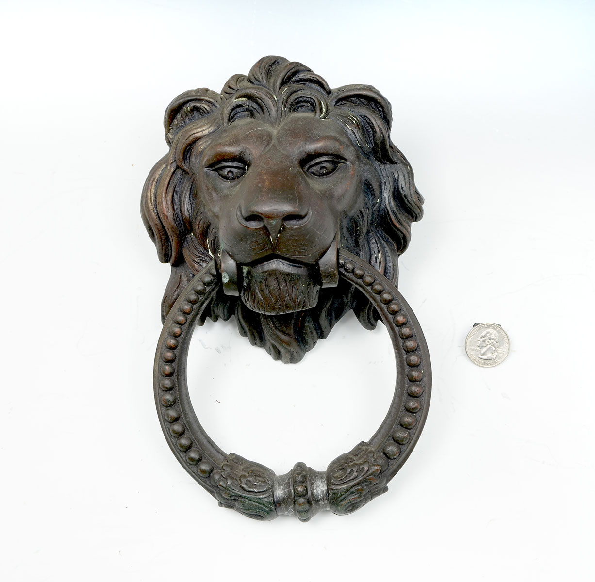 Appraisal: TH C PORTUGUESE BRONZE LION DOOR KNOCKER Heavy bronze lion