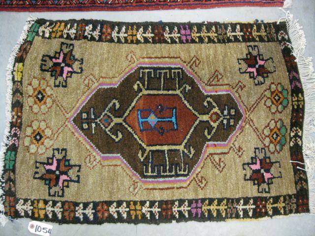 Appraisal: Kord Persian Handmade Mat central medallion tan field ' x