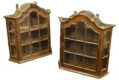 Appraisal: Two similar Dutch oak hanging display cabinets one with a