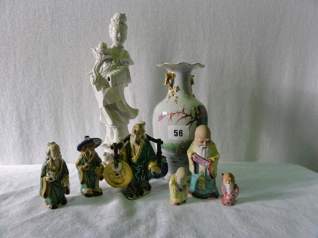 Appraisal: A collection of oriental ceramic characters including aged male water