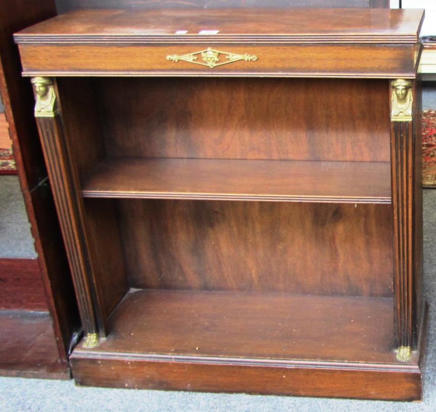 Appraisal: A small Empire style mahogany floor standing open bookcase with