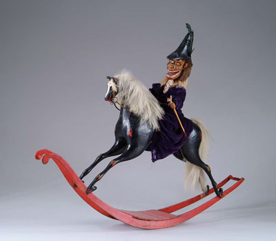 Appraisal: CLOCKWORK ROCKING HORSE WITH MONKEY ASTRIDE Of more recent vintage