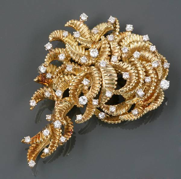 Appraisal: A diamond and k gold brooch estimated total diamond weight