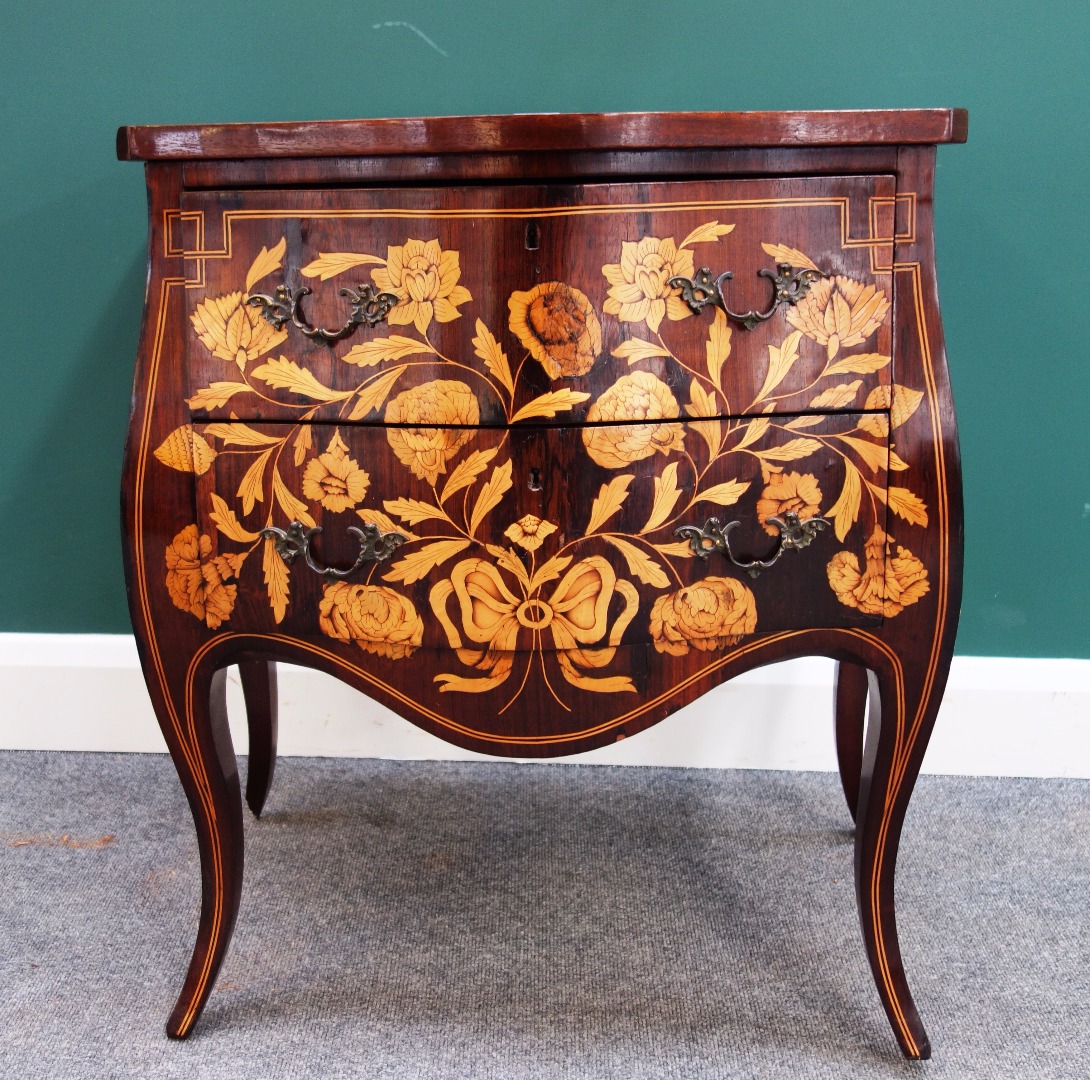 Appraisal: A th century marquetry inlaid rosewood bombe chest of two