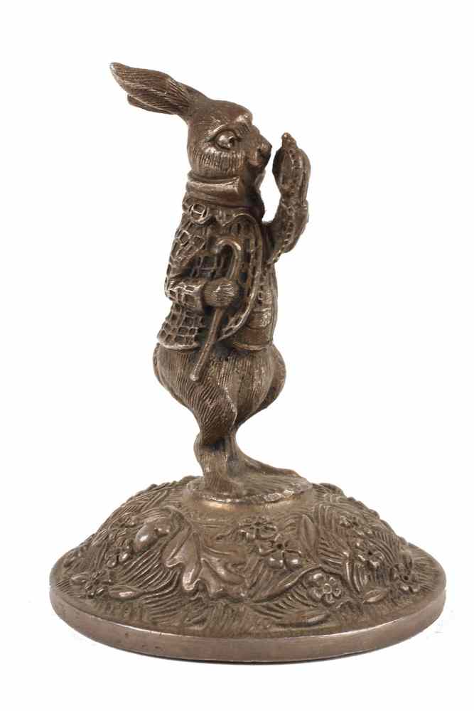 Appraisal: BRONZE PAPERWEIGHT - Silvered Bronze Paperweight of 'Alice in Wonderland'