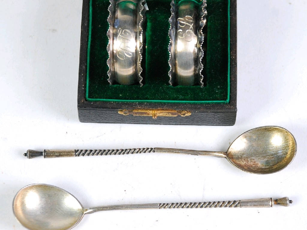 Appraisal: PAIR OF RUSSIAN SILVER COLOURED METAL TEASPOONS mark with twisted