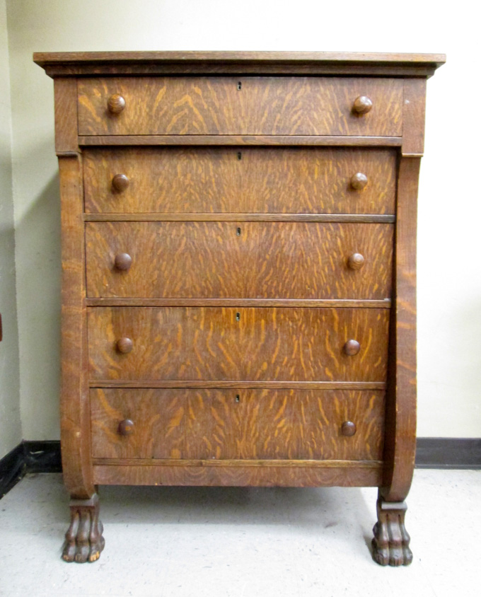 Appraisal: AN OAK CHEST OF DRAWERS Empire Revival design American c