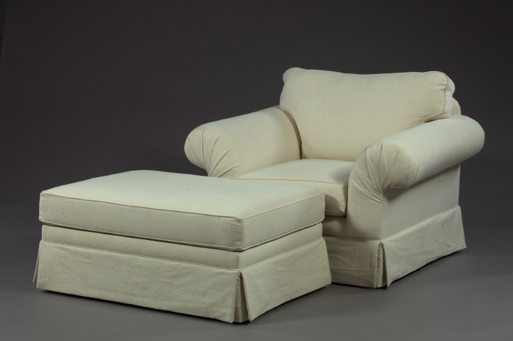 Appraisal: Contemporary Over-Stuffed Armchair and Ottoman each of generous proportions with