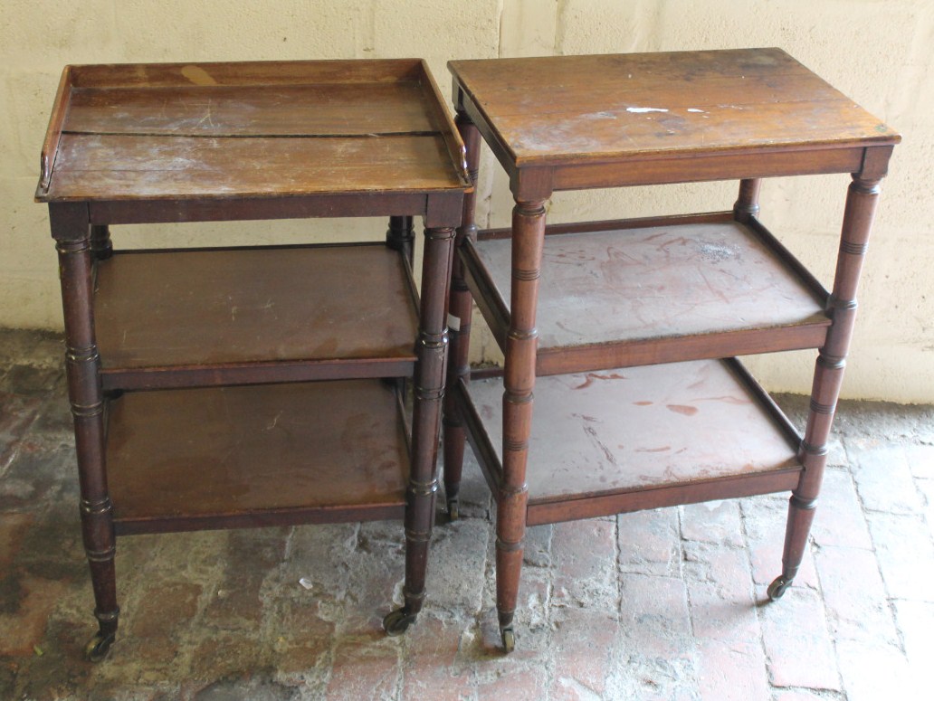 Appraisal: Two thC mahogany book trolleys each with three shelves joined