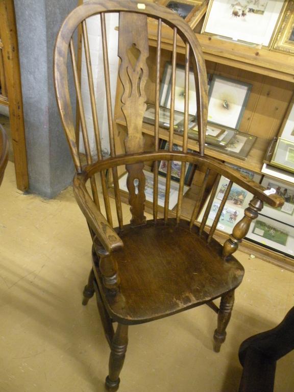 Appraisal: An ash and elm windsor armchair in mid thC style