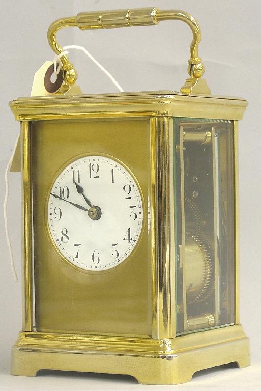 Appraisal: French carriage clock striking on a gong the white dial