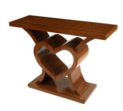 Appraisal: A rosewood veneer hall table rectangular section with heart motif